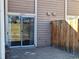 View of patio with sliding glass door access and privacy fence at 13504 E Asbury Dr, Aurora, CO 80014