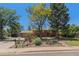 Charming brick home with well-maintained front yard and lush landscaping at 15 Pawnee Dr, Boulder, CO 80303