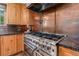 Gourmet kitchen featuring stainless steel appliances, a double oven and granite countertops at 15 Pawnee Dr, Boulder, CO 80303