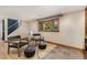 Cozy living room with large window, tile accents, and comfortable seating at 15 Pawnee Dr, Boulder, CO 80303