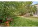 A tranquil backyard setting with a charming bench, ideal for enjoying the serene outdoor atmosphere at 20738 E Grand Pl, Aurora, CO 80015