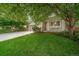 Single Gathering home, lovely front yard, well maintained lawn, porch, and a two car attached garage at 20738 E Grand Pl, Aurora, CO 80015