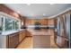 Well-equipped kitchen with stainless steel appliances and central island at 20738 E Grand Pl, Aurora, CO 80015