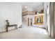 Spacious living room with staircase and views to the kitchen at 20738 E Grand Pl, Aurora, CO 80015