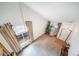 Bright living room with vaulted ceilings and large windows offering ample natural light at 20738 E Grand Pl, Aurora, CO 80015