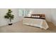 Spacious bedroom with bright windows, neutral carpet, and modern decor at 5530 Racquet Ln, Boulder, CO 80303