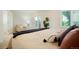 Bright bedroom with a comfortable bed, and lots of sunlight from shuttered windows at 5530 Racquet Ln, Boulder, CO 80303