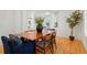 Cozy dining room with seating for six, hardwood floors, and a view into the living area, perfect for intimate gatherings at 5530 Racquet Ln, Boulder, CO 80303