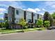 Modern townhomes feature sleek architectural details, private balconies and well maintained landscaping at 7066 W 13Th Ave, Lakewood, CO 80214