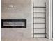 Modern fireplace with tile surround and shelving unit in living room at 7066 W 13Th Ave, Lakewood, CO 80214