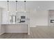 Bright kitchen with a large island and modern appliances at 7066 W 13Th Ave, Lakewood, CO 80214