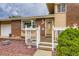 A welcoming front porch with white railings and a charming entrance at 6072 Pierson Ct, Arvada, CO 80004