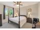 Relaxing bedroom with a four-poster bed, side tables, and a serene atmosphere, perfect for unwinding at 15723 E Orchard Pl, Aurora, CO 80016
