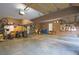Large three car garage, offering ample storage space for vehicles and other items at 15723 E Orchard Pl, Aurora, CO 80016