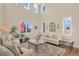Living room with high ceilings, lots of natural light and neutral tones at 15723 E Orchard Pl, Aurora, CO 80016