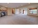 Spacious basement area with fireplace and walk out access to the outdoors at 5951 Rain Dance Trl, Littleton, CO 80125