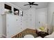Bedroom features windows, a ceiling fan, and built in storage at 3237 N Josephine St, Denver, CO 80205