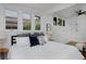Bedroom features windows, a ceiling fan, and built in storage at 3237 N Josephine St, Denver, CO 80205
