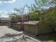 Exterior view of townhomes with individual garages in a well-maintained community at 7761 S Curtice Dr # C, Littleton, CO 80120