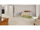Bright and spacious main bedroom with ample closet space, creating a comfortable and organized living area at 7761 S Curtice Dr # C, Littleton, CO 80120