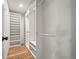 Spacious walk-in closet featuring built-in shelving and hanging rods for ample storage at 7761 S Curtice Dr # C, Littleton, CO 80120