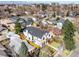An aerial view of a grand home showcasing its well-manicured yard and neighborhood surroundings at 2365 S Clayton St, Denver, CO 80210