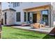 Cozy backyard with a stone patio featuring comfortable seating and seamless indoor-outdoor flow at 2365 S Clayton St, Denver, CO 80210