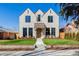 Beautiful stone facade with a well-manicured lawn and garden at 2365 S Clayton St, Denver, CO 80210
