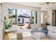 Inviting living room with expansive sliding doors leading to a private outdoor patio at 2365 S Clayton St, Denver, CO 80210