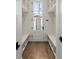 Well-organized mudroom with custom storage, bench seating, and direct access to the outdoors at 2365 S Clayton St, Denver, CO 80210