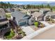 Stunning aerial view of a modern home with a well-manicured lawn and inviting curb appeal at 763 Sage Forest Ln, Monument, CO 80132