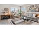 Cozy living room featuring neutral tones and filled with natural light at 763 Sage Forest Ln, Monument, CO 80132