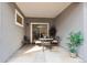 Charming patio with stone floor, neutral color scheme, and ample space for entertaining guests at 763 Sage Forest Ln, Monument, CO 80132