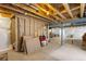 Unfinished basement featuring open ceiling, concrete floors, and blank canvas for customization at 10057 Des Moines St, Parker, CO 80134