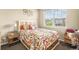 Bedroom with natural light, stylish decor, and comfortable furnishings at 10057 Des Moines St, Parker, CO 80134