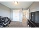 This carpeted bedroom features a double door closet and an open doorway to the house at 11677 Park South Ln, Parker, CO 80138