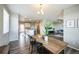 Open concept floorplan featuring dining room, kitchen, and living room at 11677 Park South Ln, Parker, CO 80138