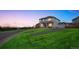 Charming home with lush green lawn, complementing the surrounding landscape at 11677 Park South Ln, Parker, CO 80138