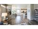 View of open living space, connecting living room, dining area and kitchen at 11677 Park South Ln, Parker, CO 80138