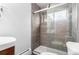 Updated bathroom featuring glass enclosed shower with subway tiles at 200 N Sherman St # 7, Denver, CO 80203