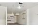 Bright garage space with shelving, storage and bright lighting at 9351 Amison Cir # 104, Parker, CO 80134
