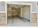 Unit 104 garage featuring shelving, storage and bright lighting at 9351 Amison Cir # 104, Parker, CO 80134