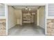 Unit 104 garage featuring shelving, storage and bright lighting at 9351 Amison Cir # 104, Parker, CO 80134