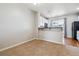 Bright living room with breakfast bar and view of the kitchen at 9351 Amison Cir # 104, Parker, CO 80134