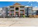 Exterior of a well-maintained apartment building with multiple balconies at 804 Summer Hawk Dr # 303, Longmont, CO 80504