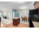 Open concept kitchen and dining area with island at 804 Summer Hawk Dr # 303, Longmont, CO 80504