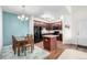 Modern kitchen and dining area with stainless steel appliances at 804 Summer Hawk Dr # 303, Longmont, CO 80504
