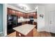 Well-lit kitchen with ample counter space and modern appliances at 804 Summer Hawk Dr # 303, Longmont, CO 80504