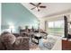 Bright living room with sliding glass door leading to the balcony at 804 Summer Hawk Dr # 303, Longmont, CO 80504