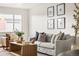 Cozy living room with a comfortable sofa, wood coffee table, and decorative pillows at 7050 W Cedar Ave # 108, Lakewood, CO 80226